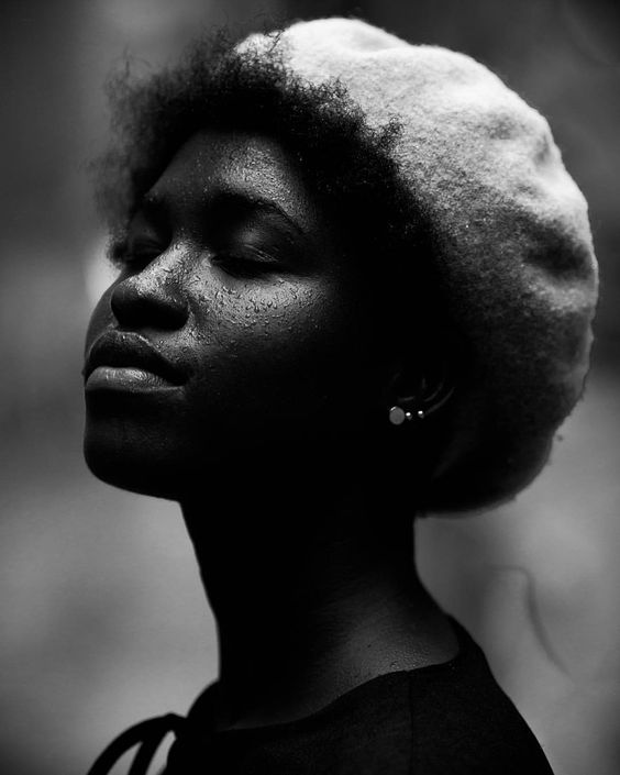 Black and white photo black woman wearing beret