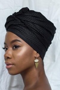 black girl wearing black turban